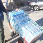 640px-Boy_Scouts_Wheeling_Donated_Water_Bottles